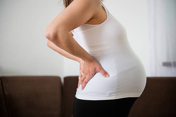 Back pain during pregnancy woman