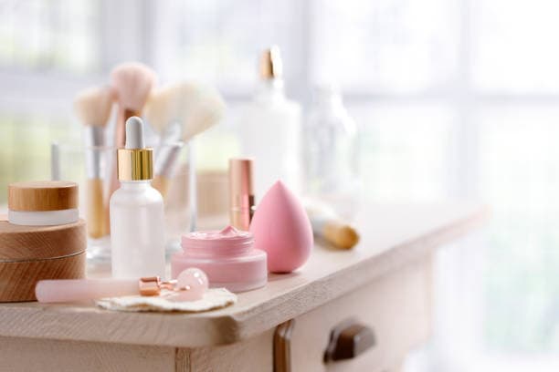 Bottles of top eczema moisturizers arranged on a table