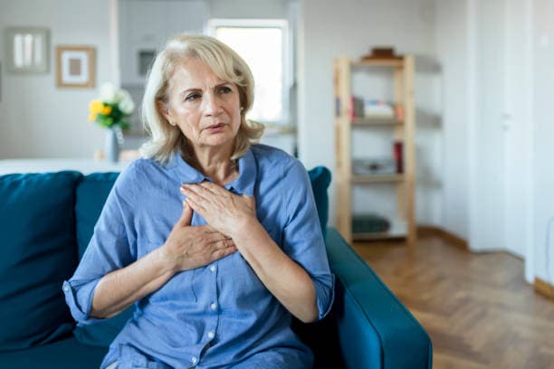 Person experiencing chest pain from anxiety