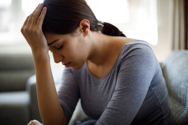 Individual dealing with depression symptoms in an Indian context