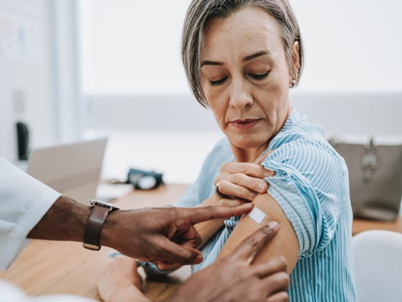 Person checking for early flu symptoms