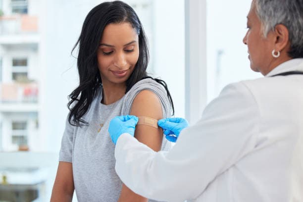 Adult practicing self-care for flu