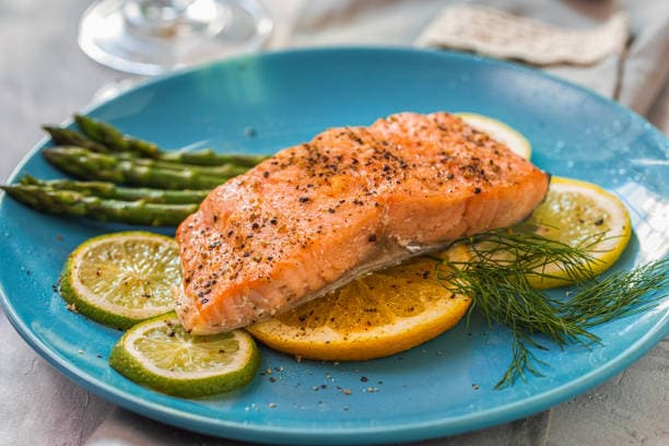 Weight loss friendly meals like baked salmon and asparagus