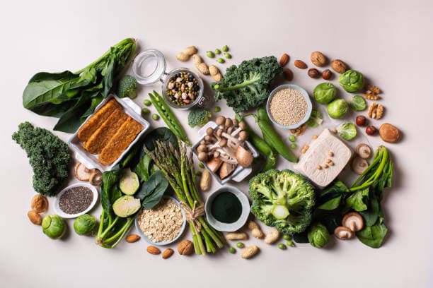 Assorted fresh ingredients for healthy dinner recipes like vegetables, proteins, and grains