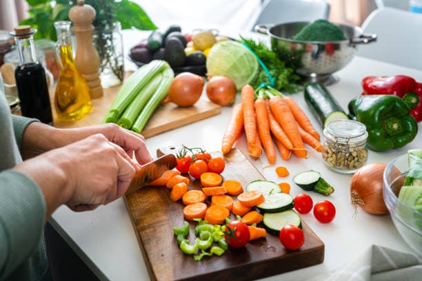 Step-by-step preparation of a healthy dinner recipe with fresh veggies and proteins
