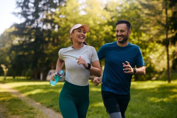 Person jogging outdoors to manage hypertension