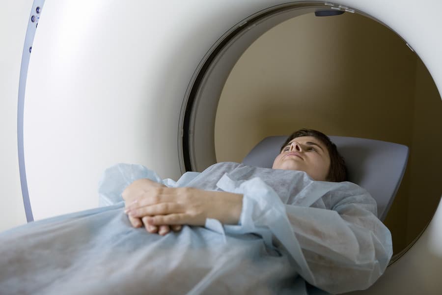 Medical professional conducting migraine diagnostic tests