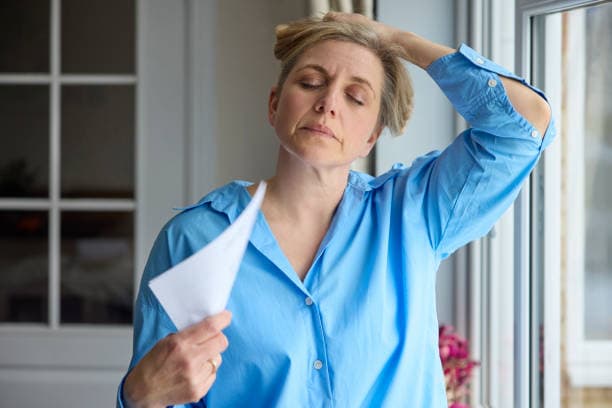 Woman experiencing mood swings during menopause