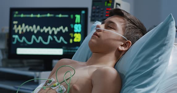 Hero image of a person sleeping with a heart monitor