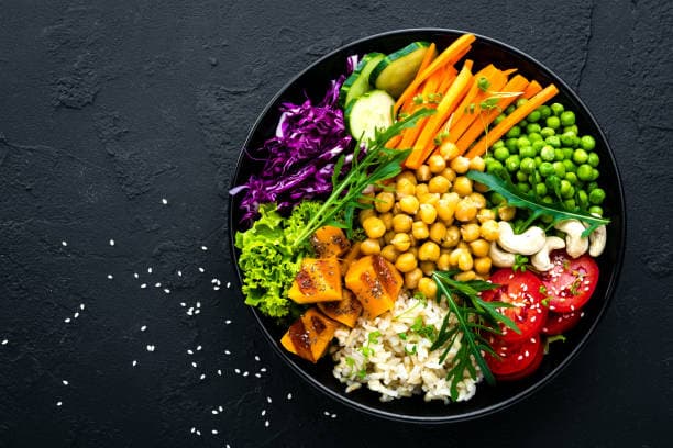 Vibrant vegetarian healthy lunch ideas with fresh fruits, vegetables, and grains